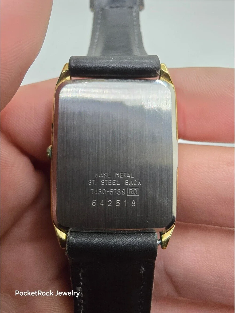 Seiko Quartz Rectangle Gold Tone Case Black Dial Black Leather Strap Watch